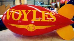 Helium advertising blimps for sale in Texas - 11 ft. blimp with artwork